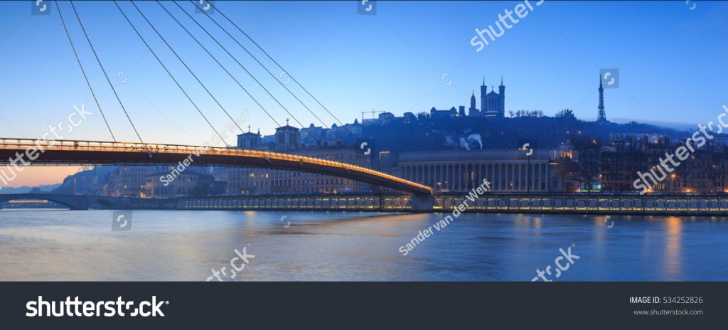 stock-photo-panorama-of-footbridge-passerelle-palais-du-justice-over-the-saone-river-in-lyon-france-during-534252826